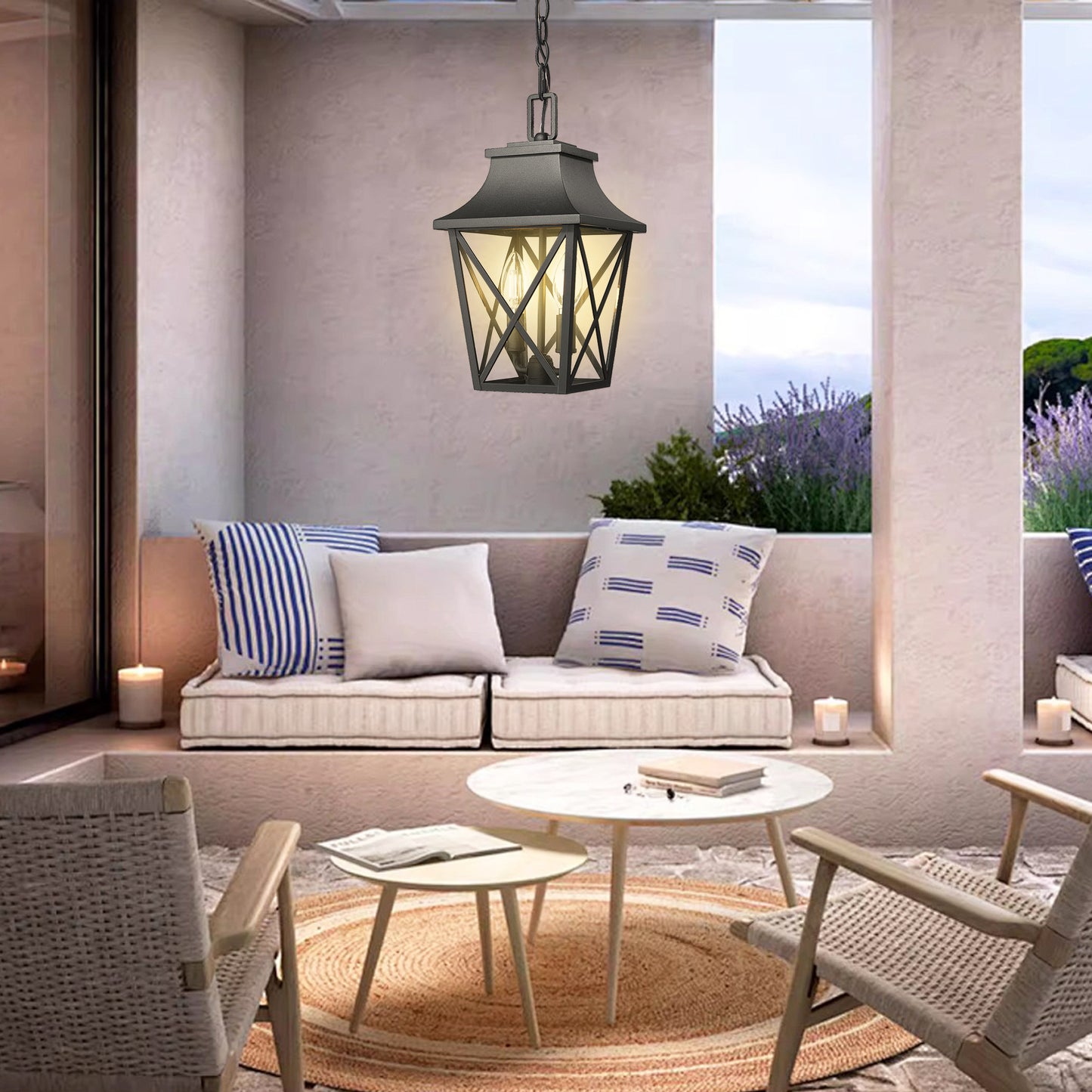 Black metal outdoor pendant light with traditional lantern design and clear glass panels