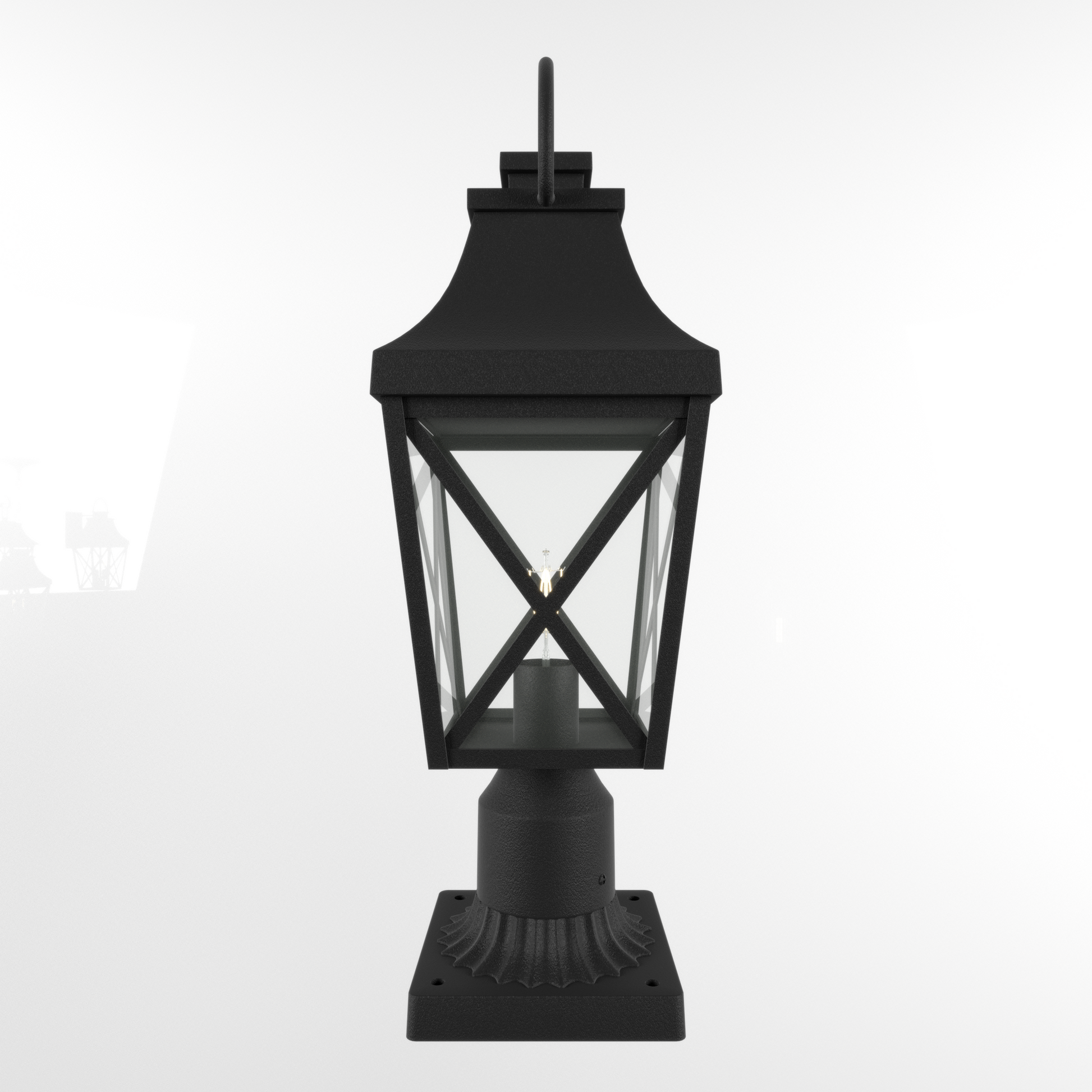 Black traditional lantern post light with clear glass panes and metal accents
