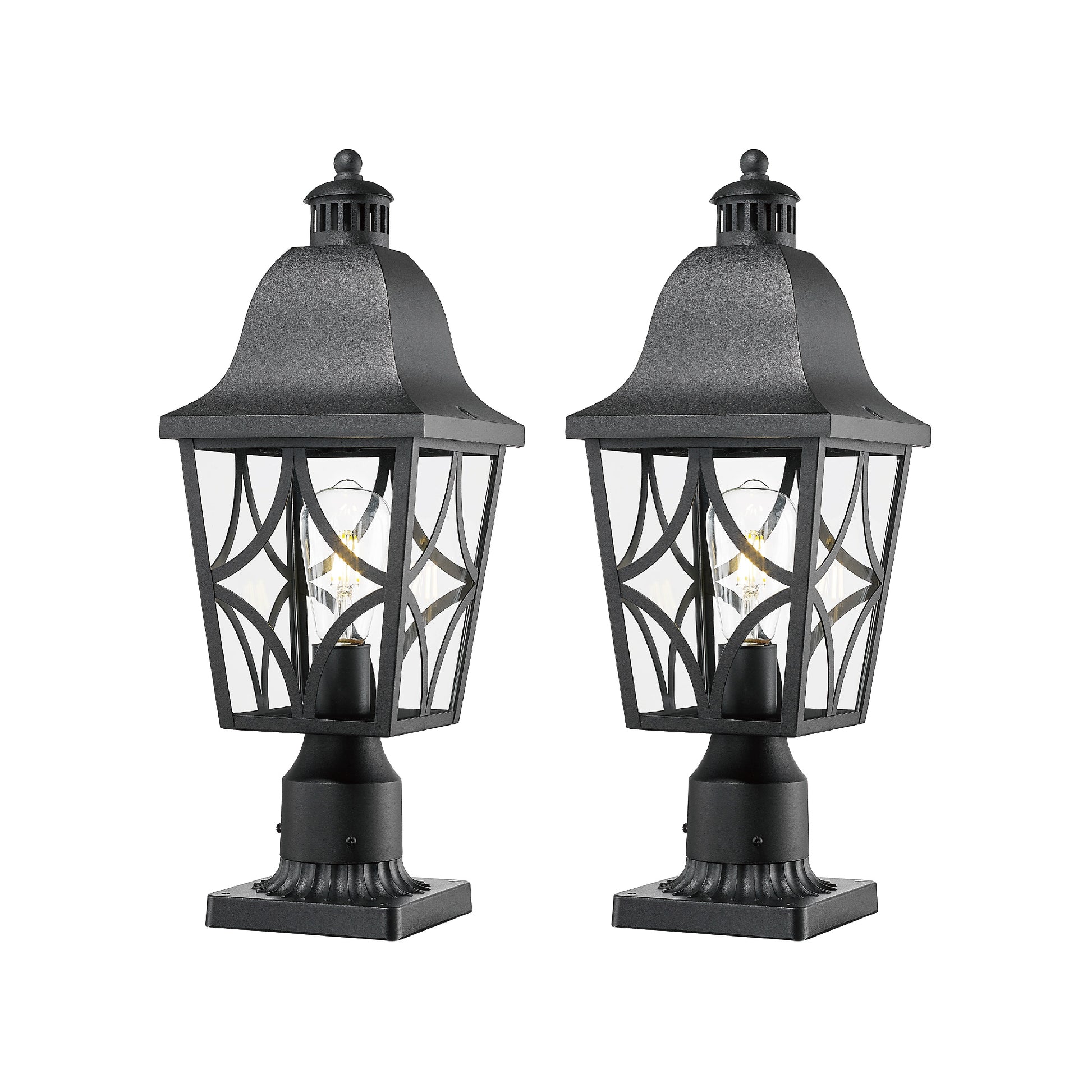 Pair of black metal outdoor post lights with clear glass panels and decorative scrollwork