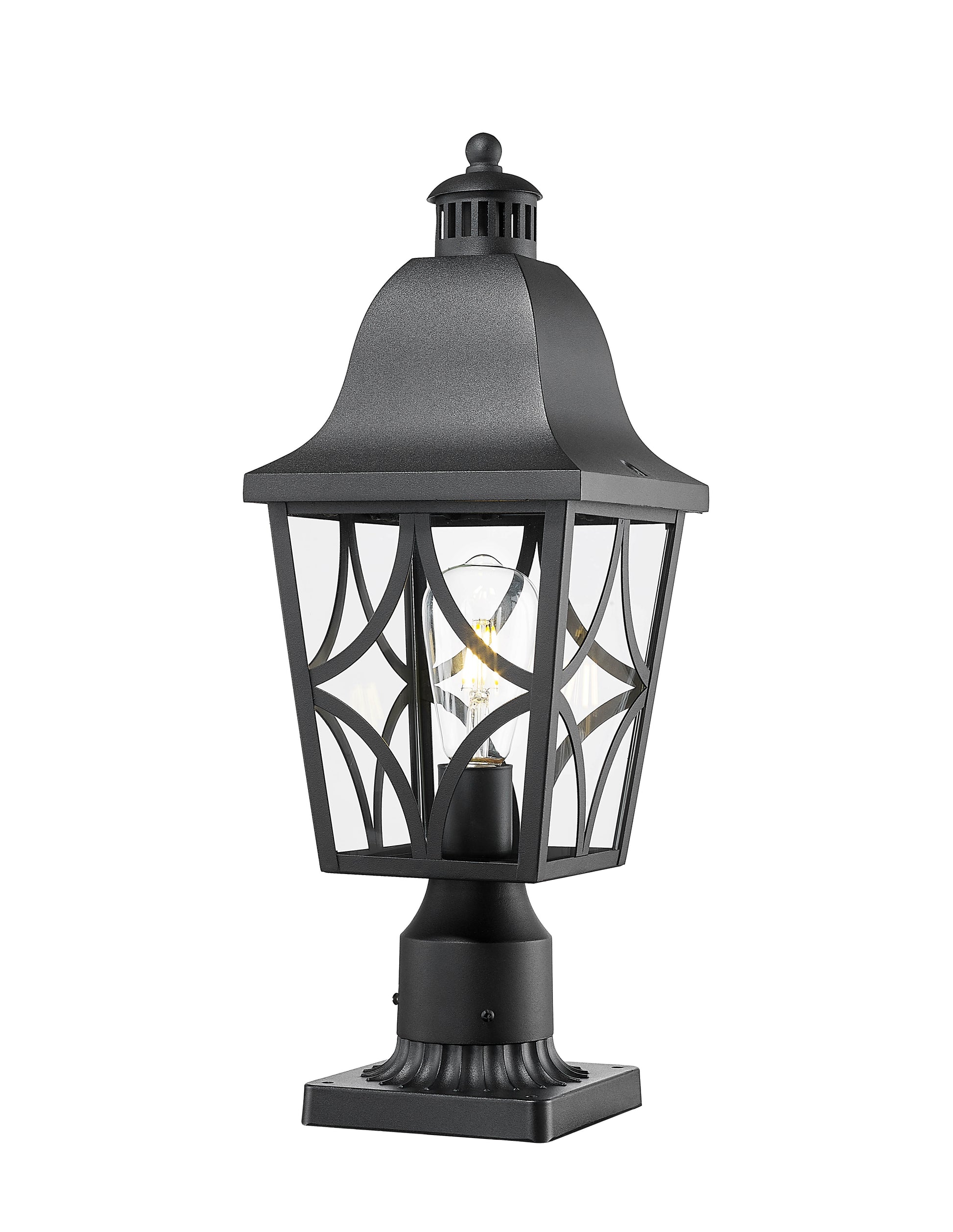 Black metal post lantern with decorative scrollwork and clear seeded glass