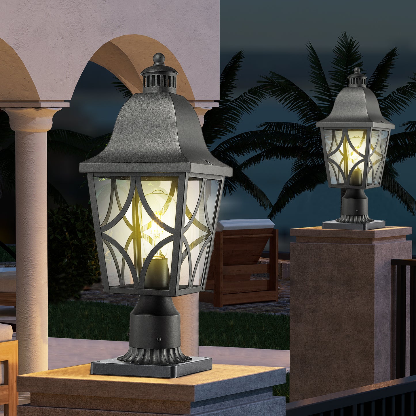 Black metal pillar post lantern with ornate glass panels and visible filament bulb