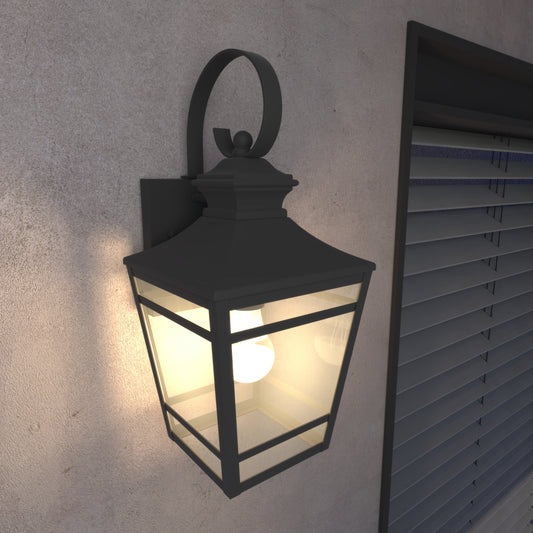 Black outdoor lantern with clear glass panes and warm LED bulb