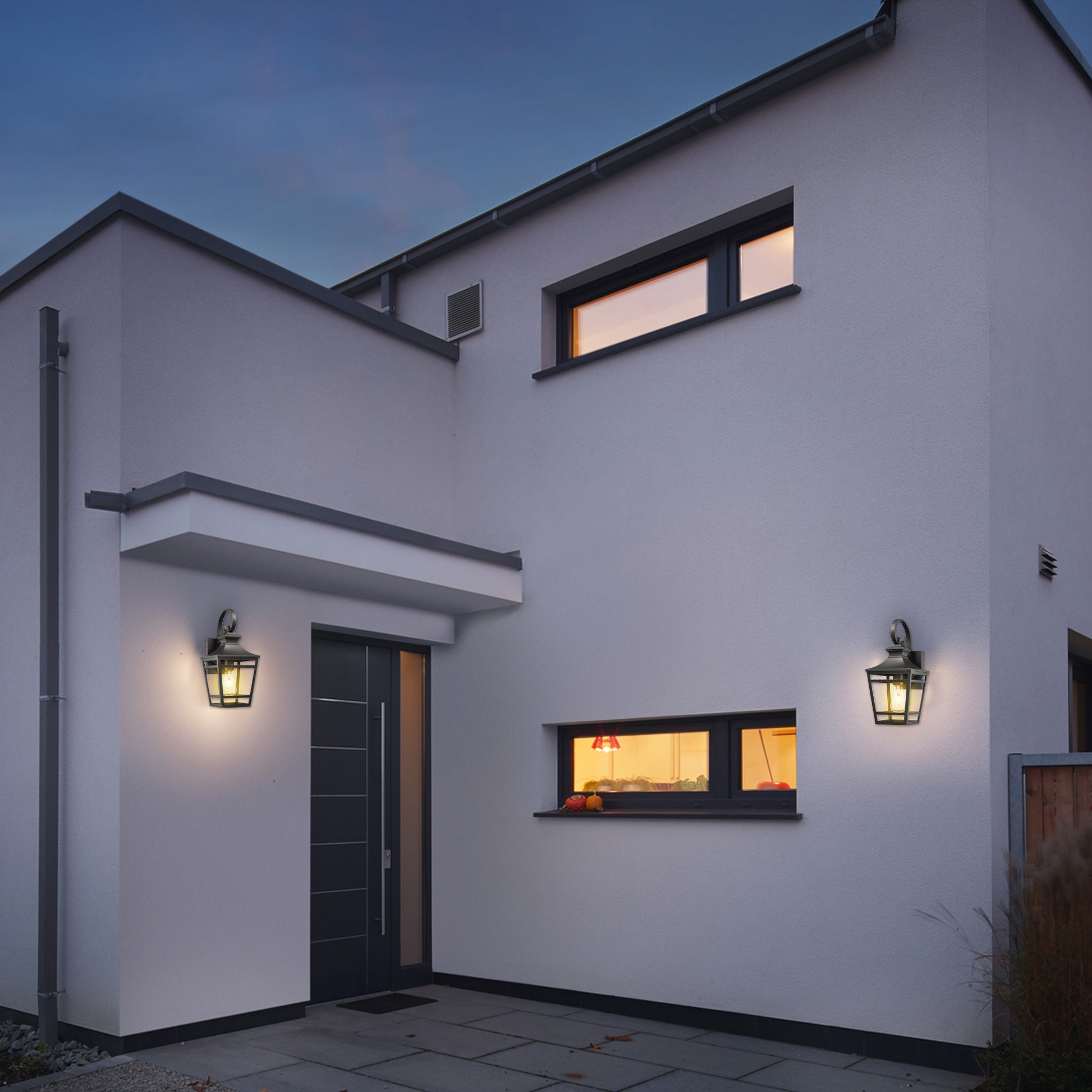 Black metal exterior lantern with clear glass panels