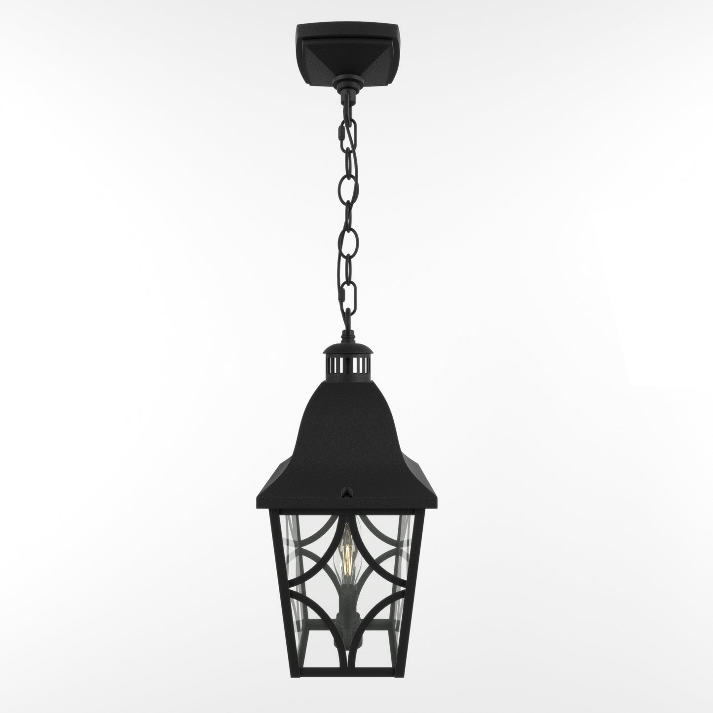 Black metal hanging lantern with clear glass panels and decorative scrollwork