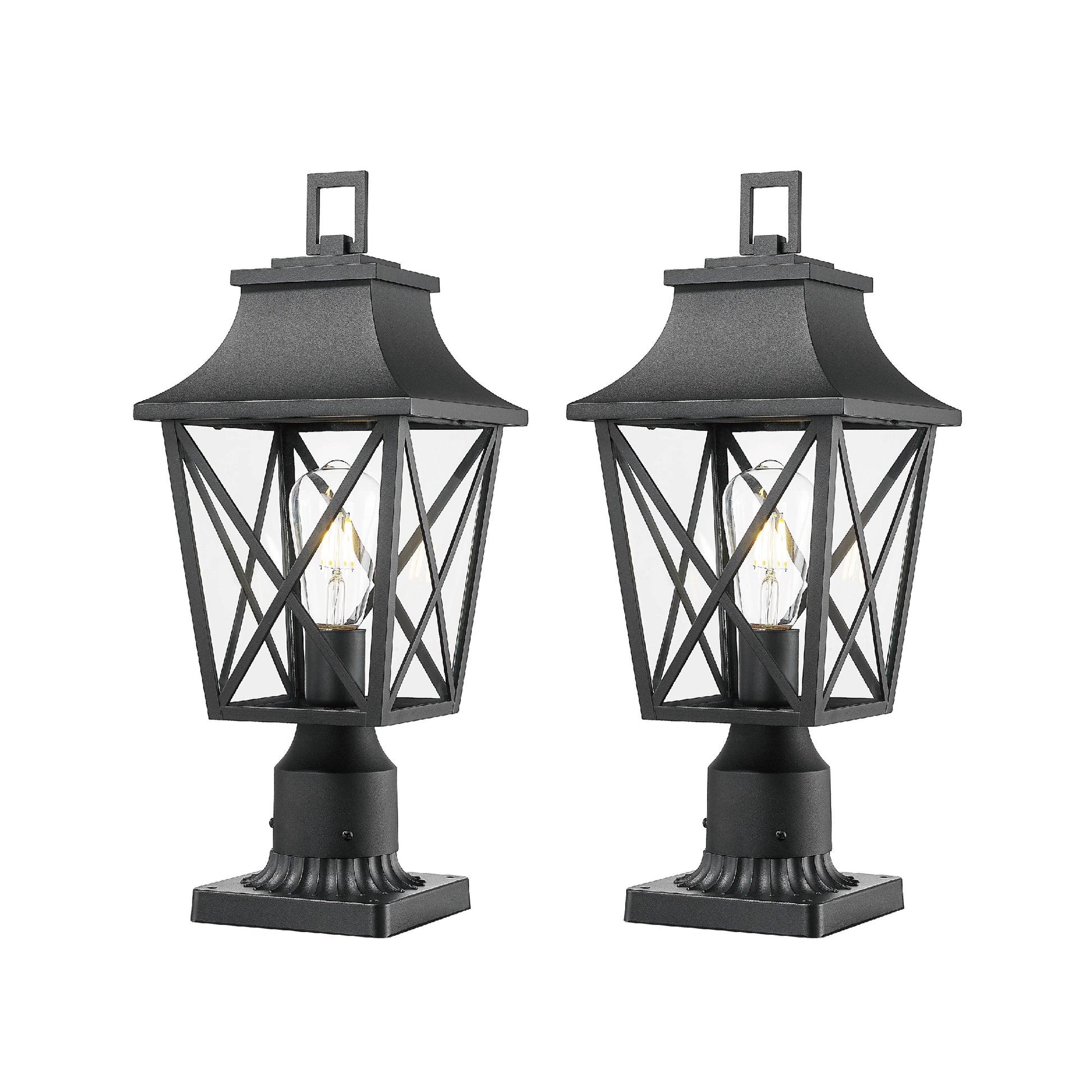 Two black metal outdoor post lights with clear glass panes and exposed Edison bulbs