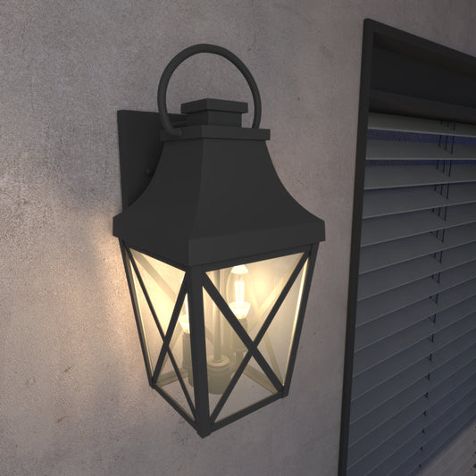 Black outdoor lantern with glass panes and two Edison bulbs