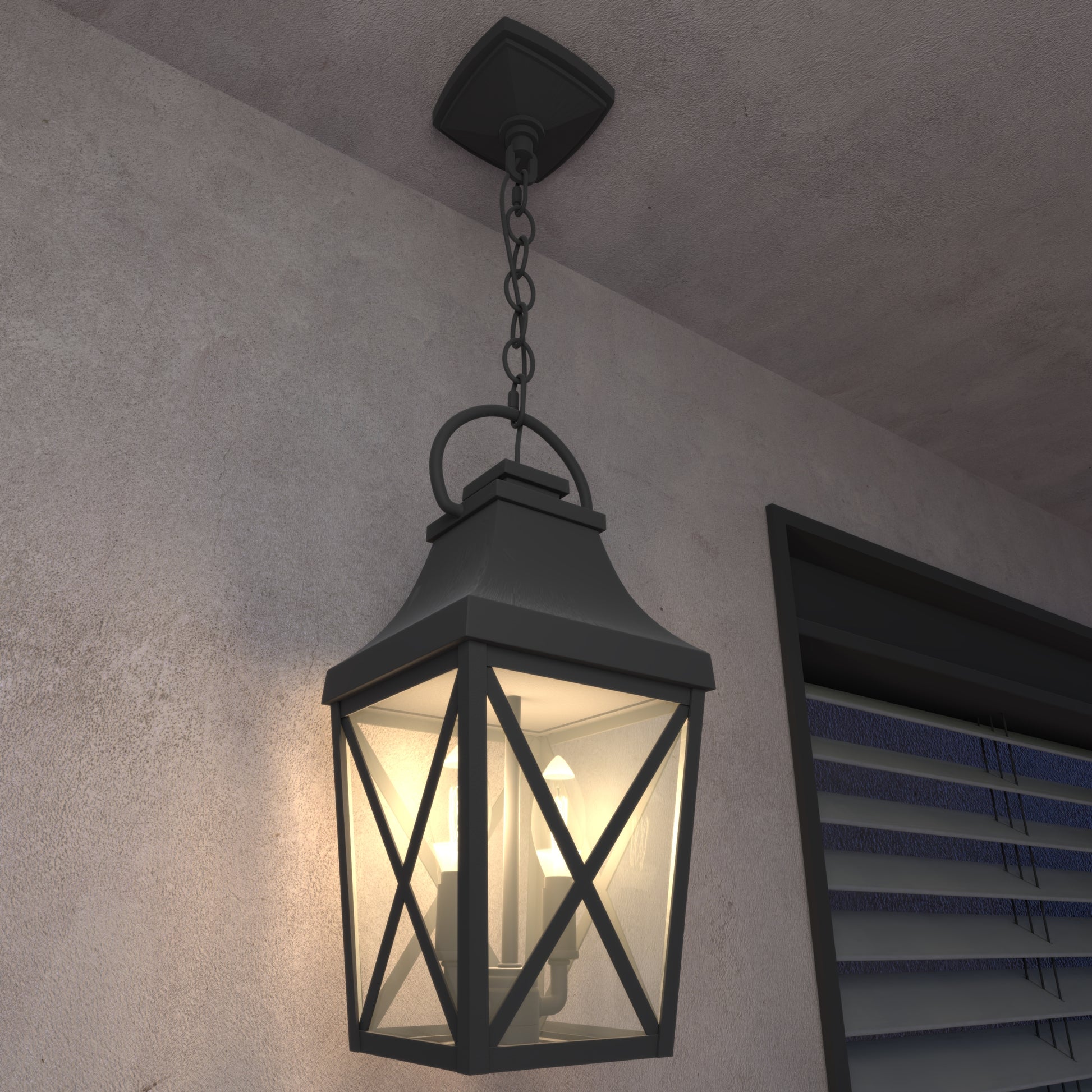 Classic black outdoor lantern with clear glass panes and ornate chain