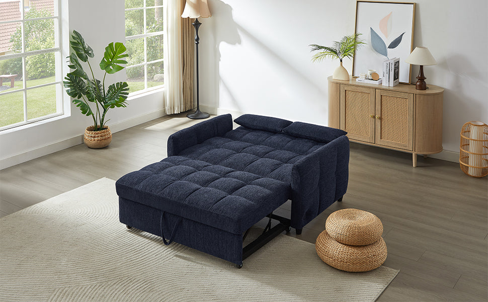 Navy blue futon sofa bed with tufted cushions and pullout mattress
