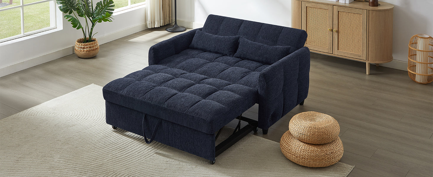 Dark blue upholstered sofa bed with tufted mattress and pullout ottoman