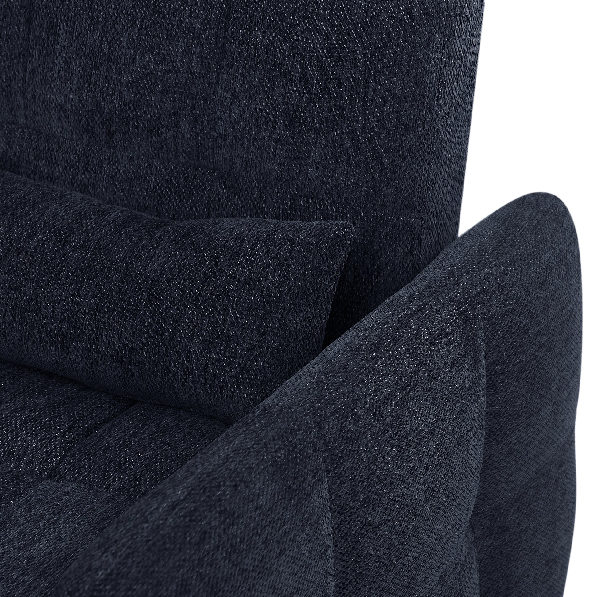 Textured navy blue fabric on a comfortable accent chair