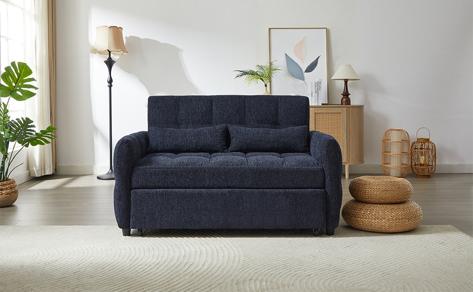 Navy blue fabric sleeper sofa with tufted back and two throw pillows