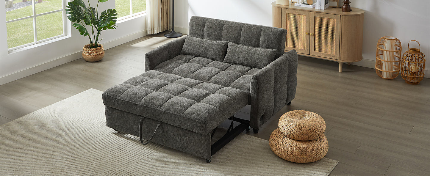 Gray upholstered sofa bed with tufted cushions and pullout ottoman
