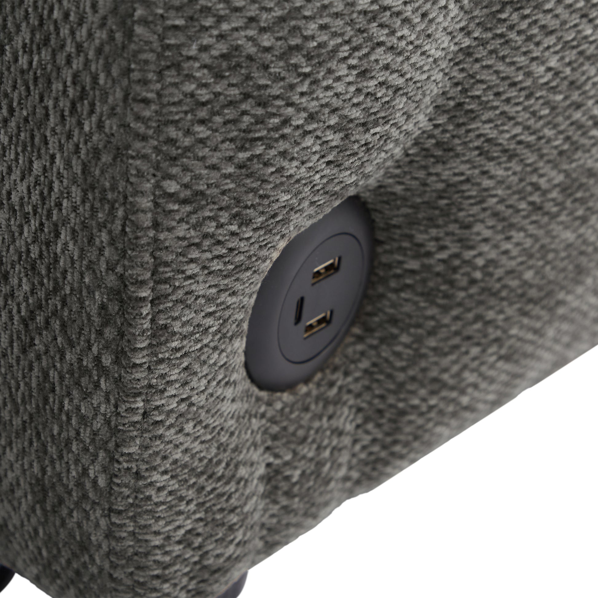 Closeup of gray fabric recliner arm with dual USB charging port