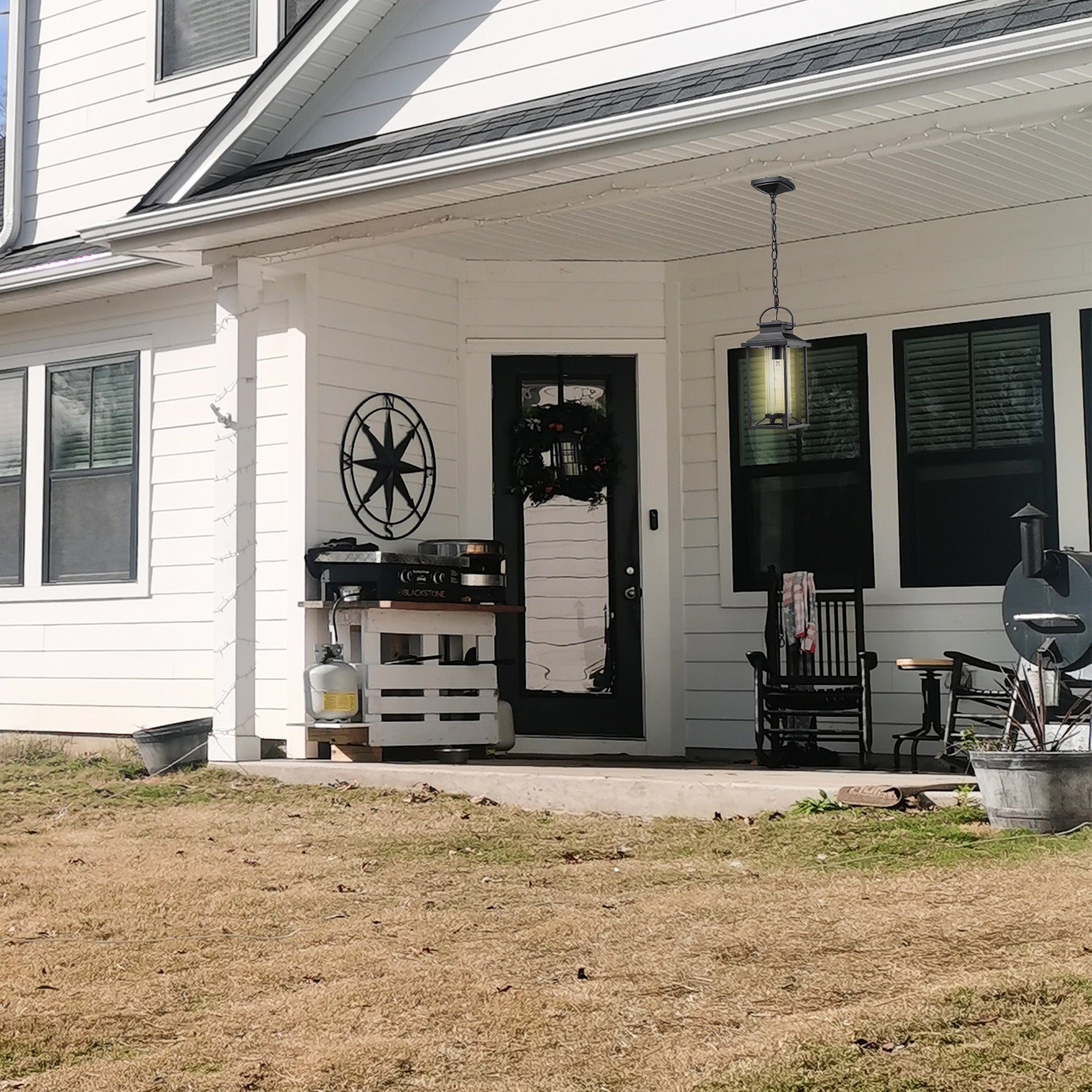 Black metal porch lantern with clear glass panels