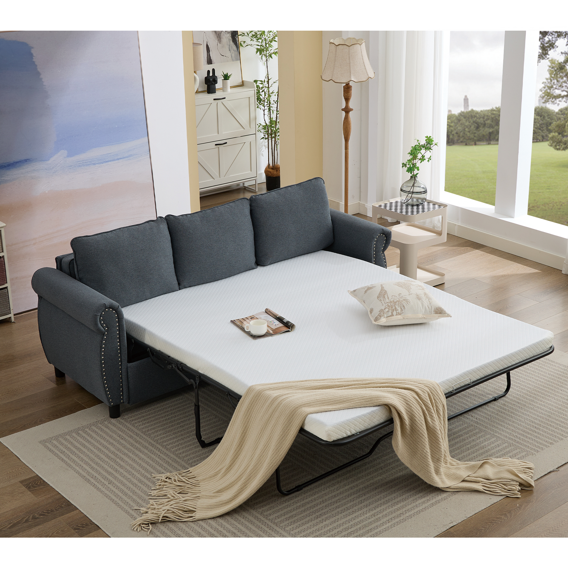 Dark grey sofa bed with pullout mattress