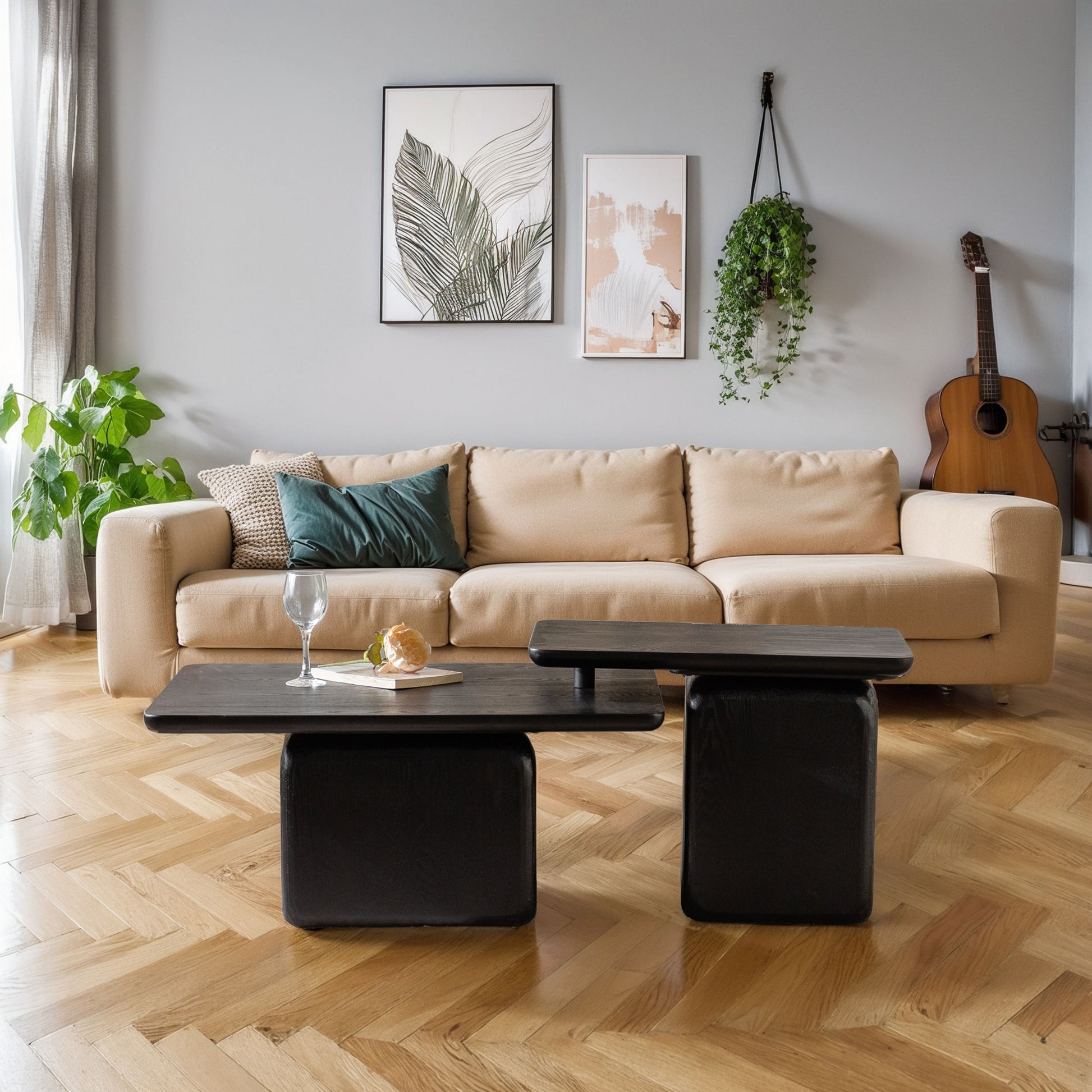 Modern black nesting coffee table with wood grain texture