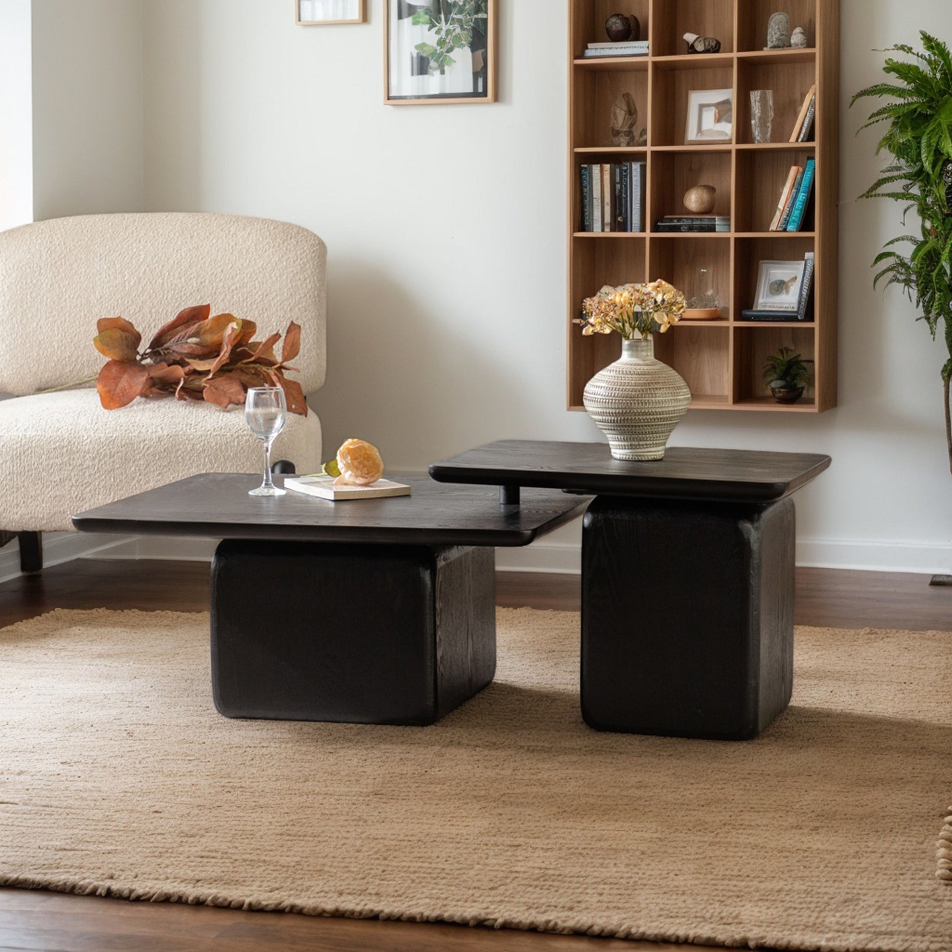 Dark wood nesting coffee tables with thick block bases