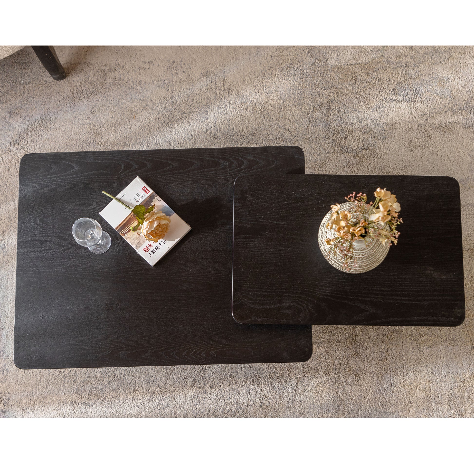 Modern black wood nesting coffee tables with rounded corners