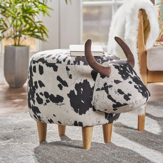 Cow print ottoman with brown horns and wooden legs