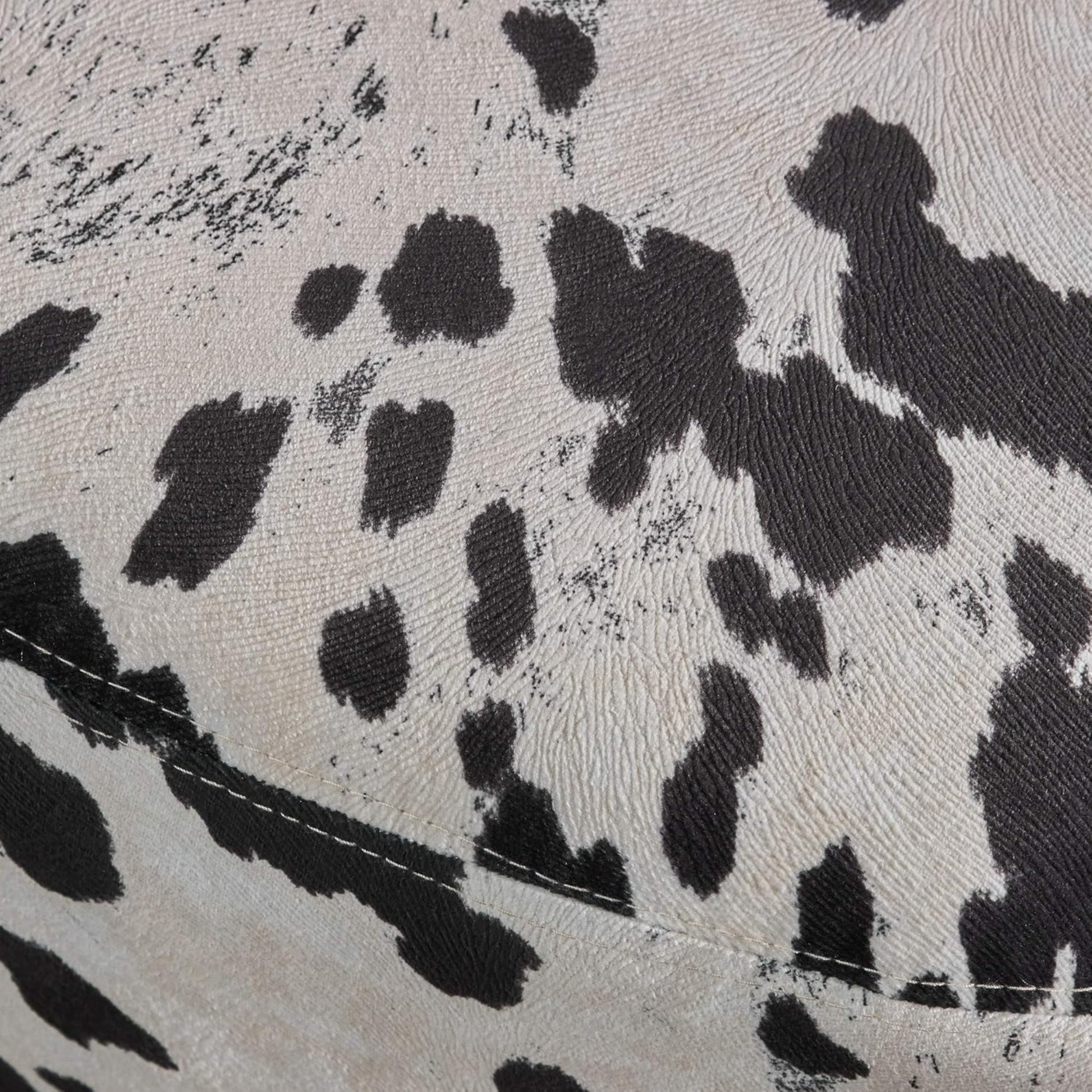 Textured black and white cowhide print fabric for upholstery