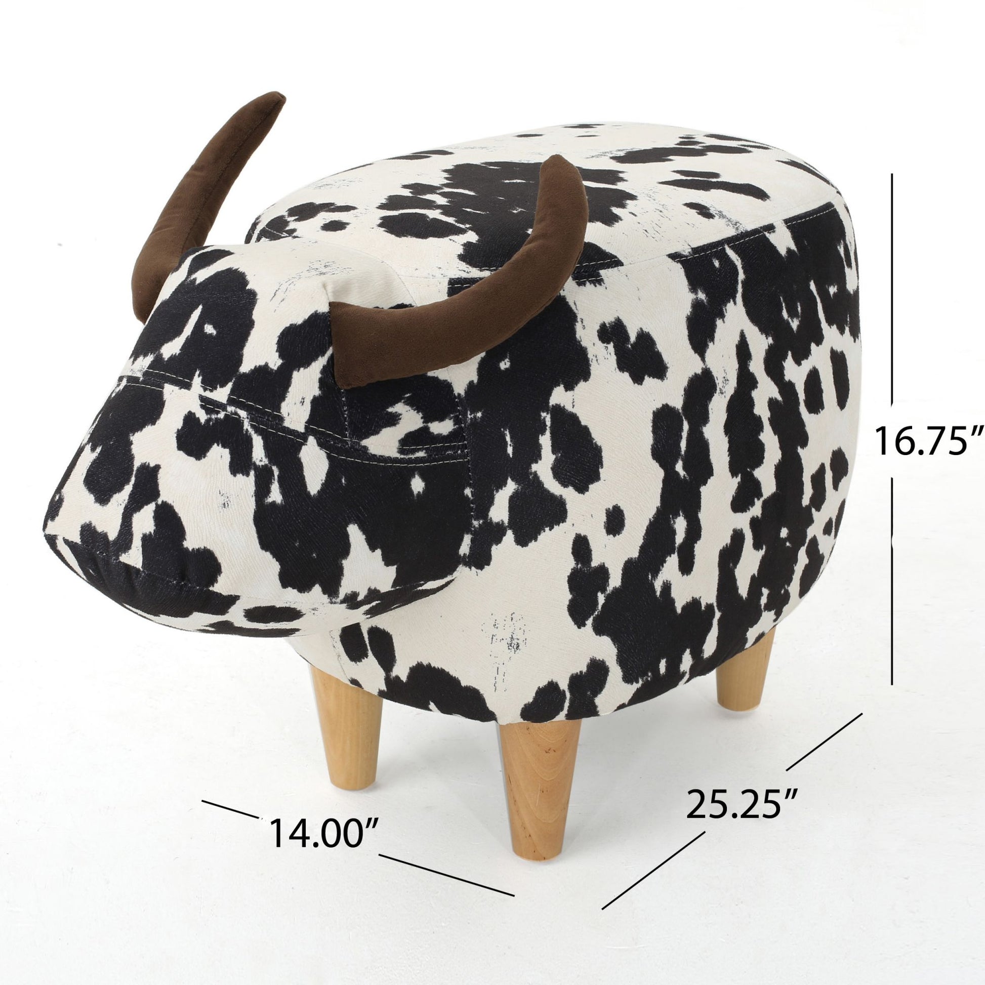 Cowshaped fabric ottoman with black and white print and wooden legs