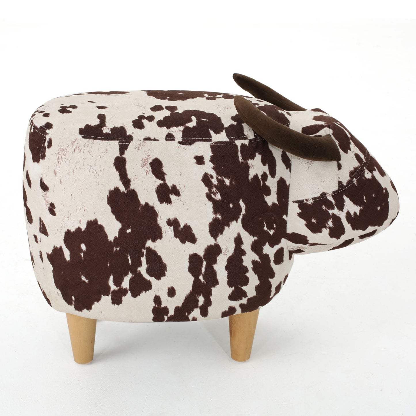 Farm animal ottoman with cow print fabric and brown horns