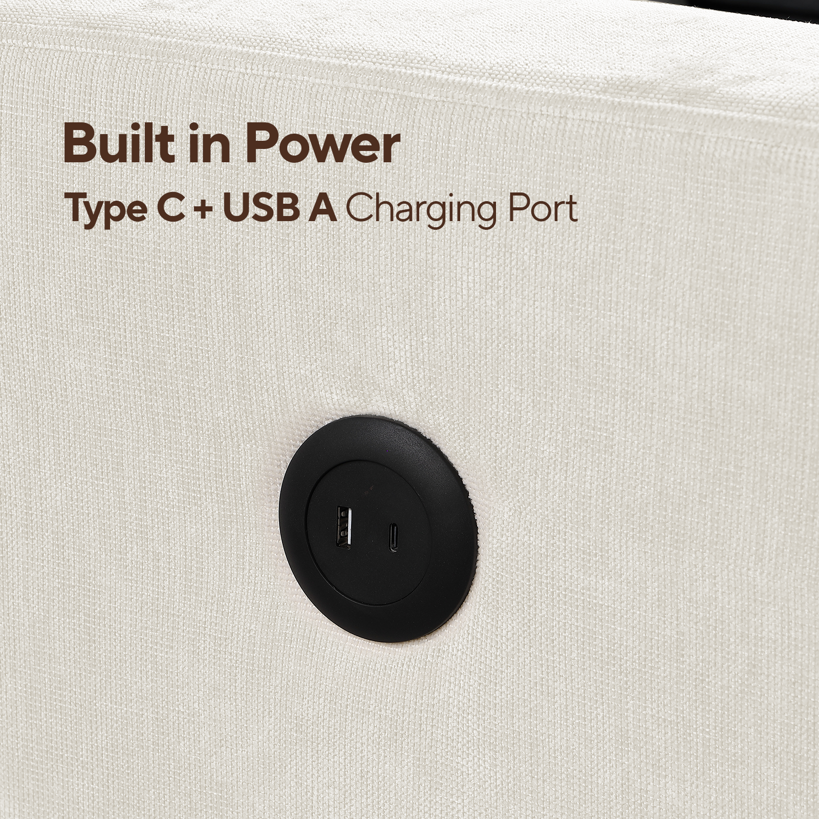 Closeup of a beige upholstered sofa arm with a builtin black power hub featuring USBC and USBA ports