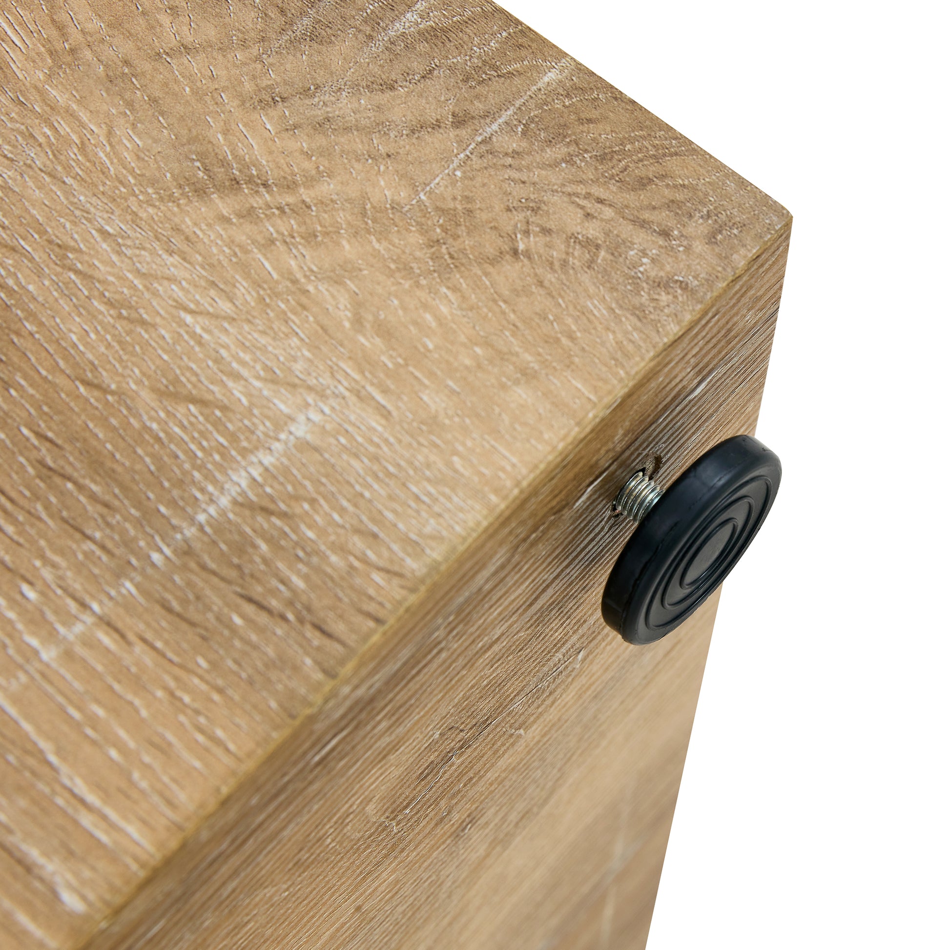 Wooden bedside table corner with a black adjustable foot