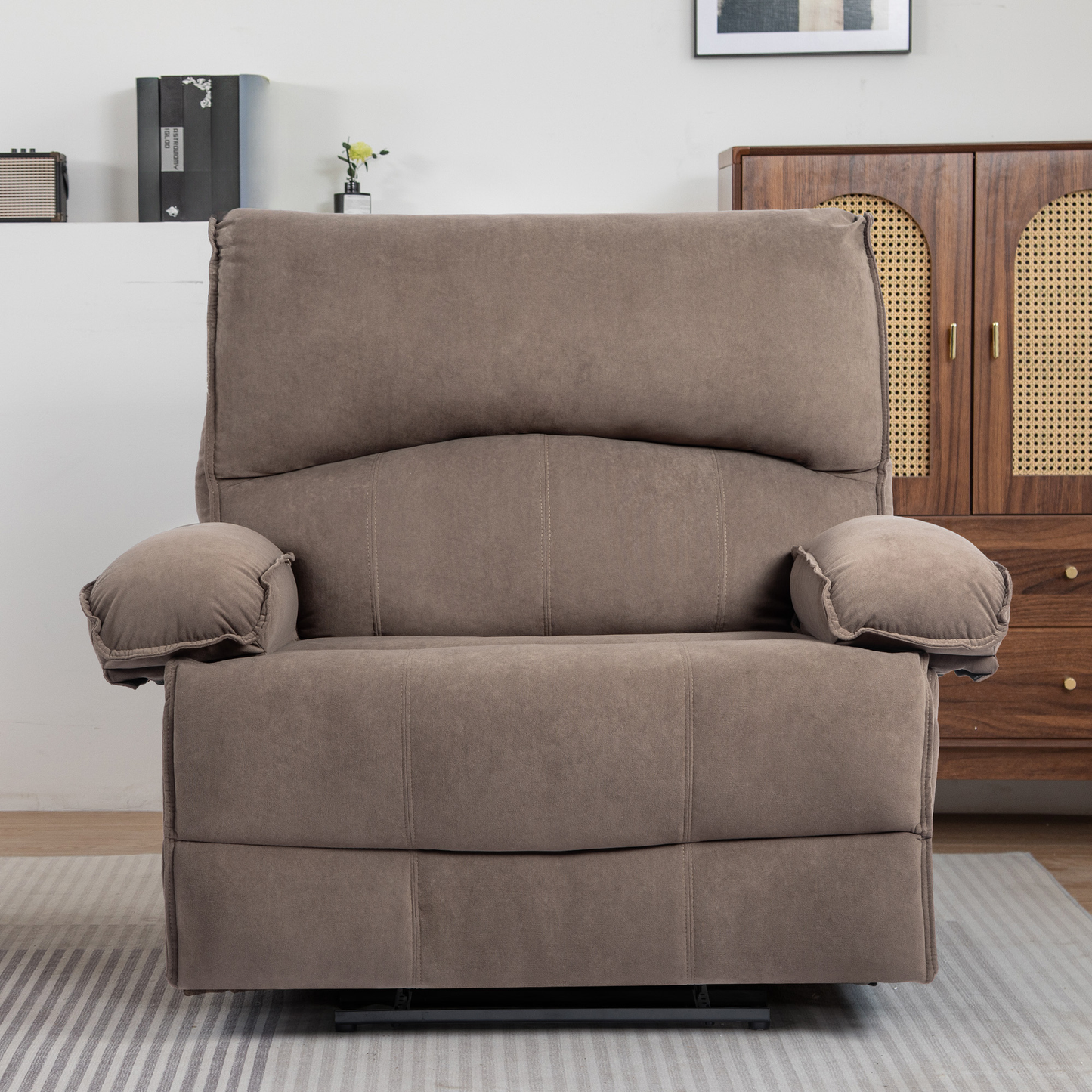 Plush taupe fabric recliner chair with padded armrests and lumbar support