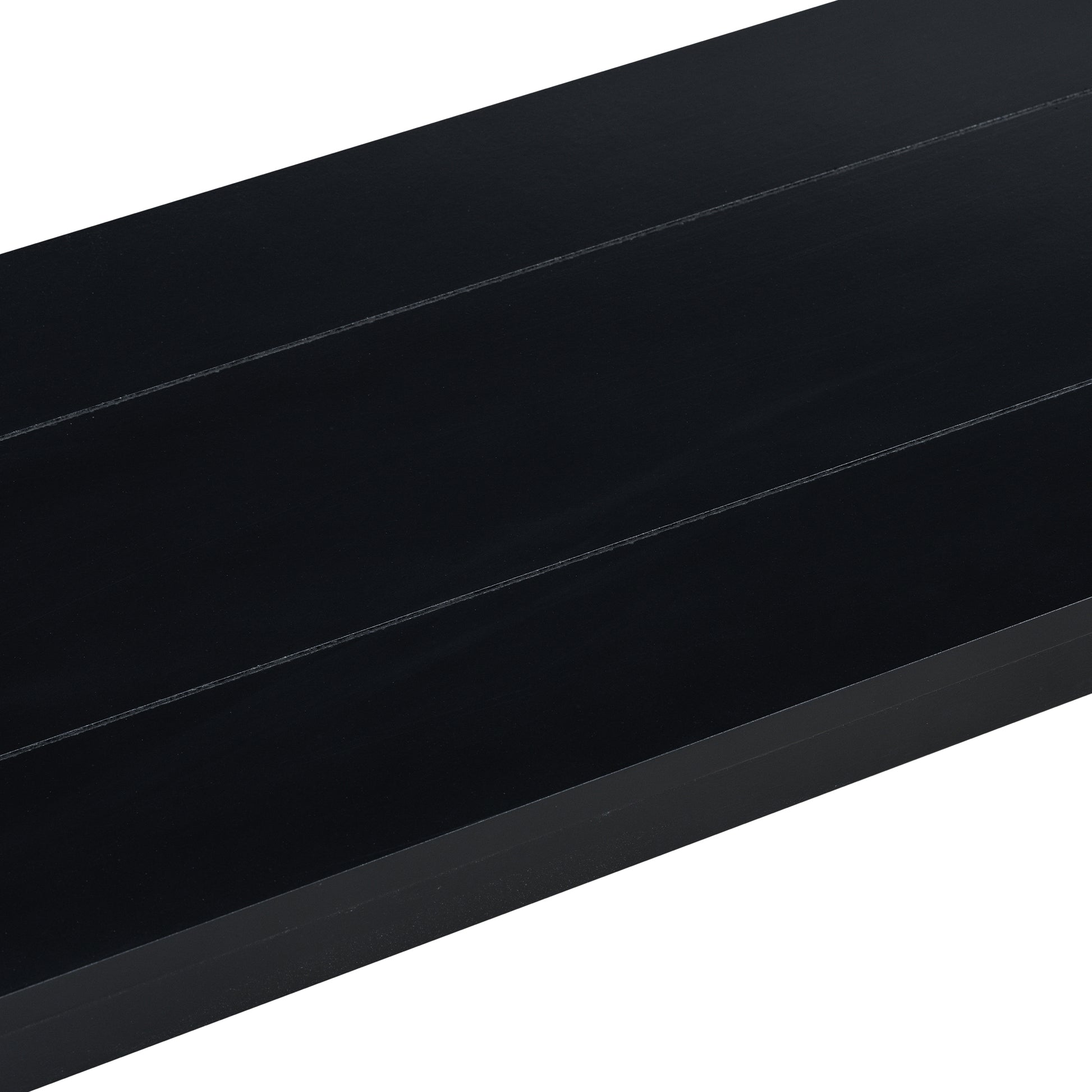 Sleek black floating shelf with subtle grooves perfect for modern decor
