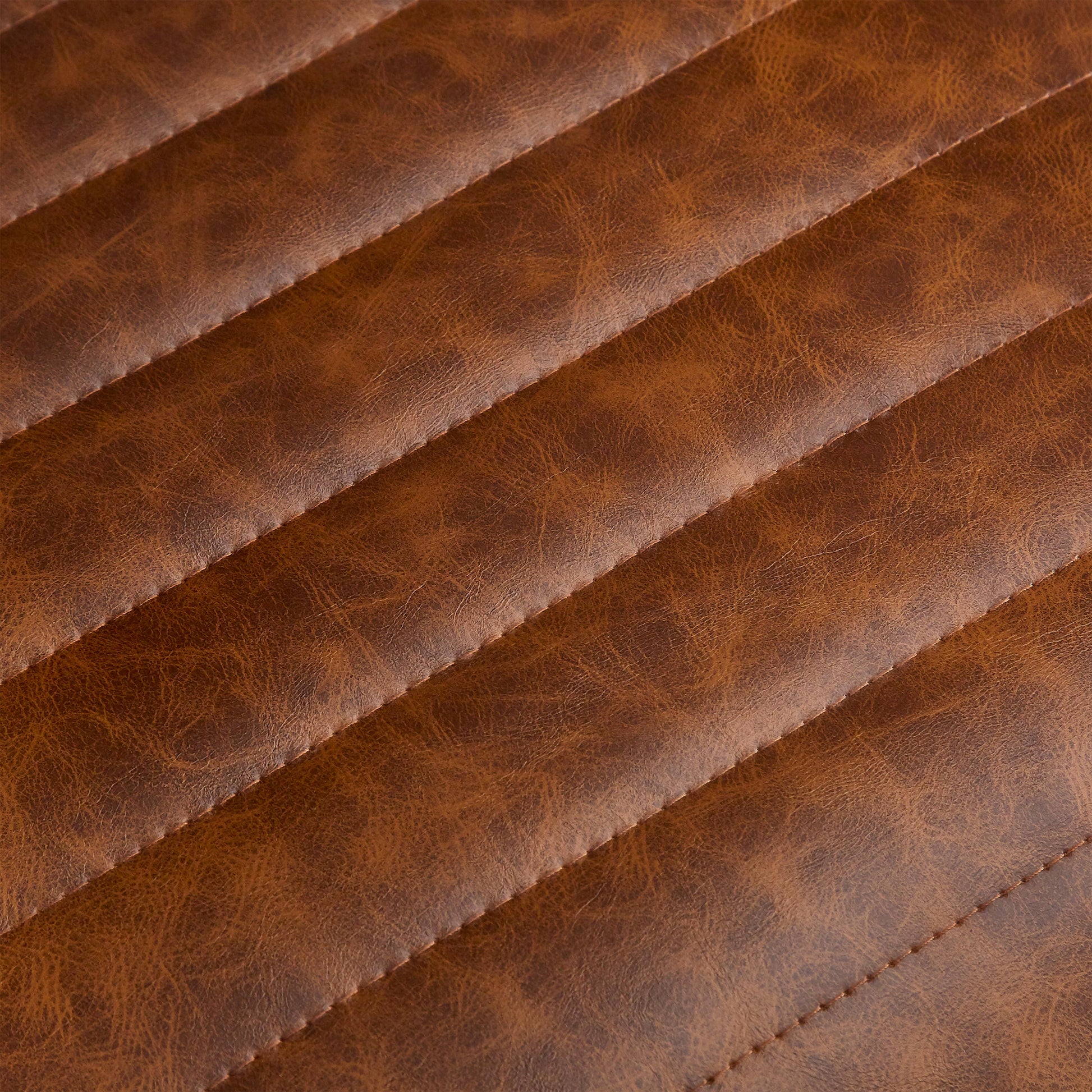 Brown quilted faux leather fabric detail