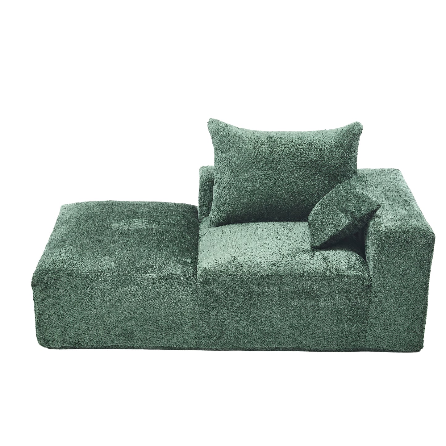Plush green sectional sofa with ottoman and accent pillows