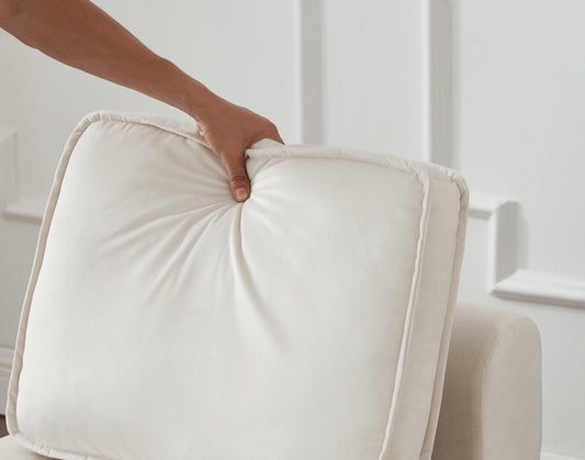 Cream velvet sofa cushion with piped edges
