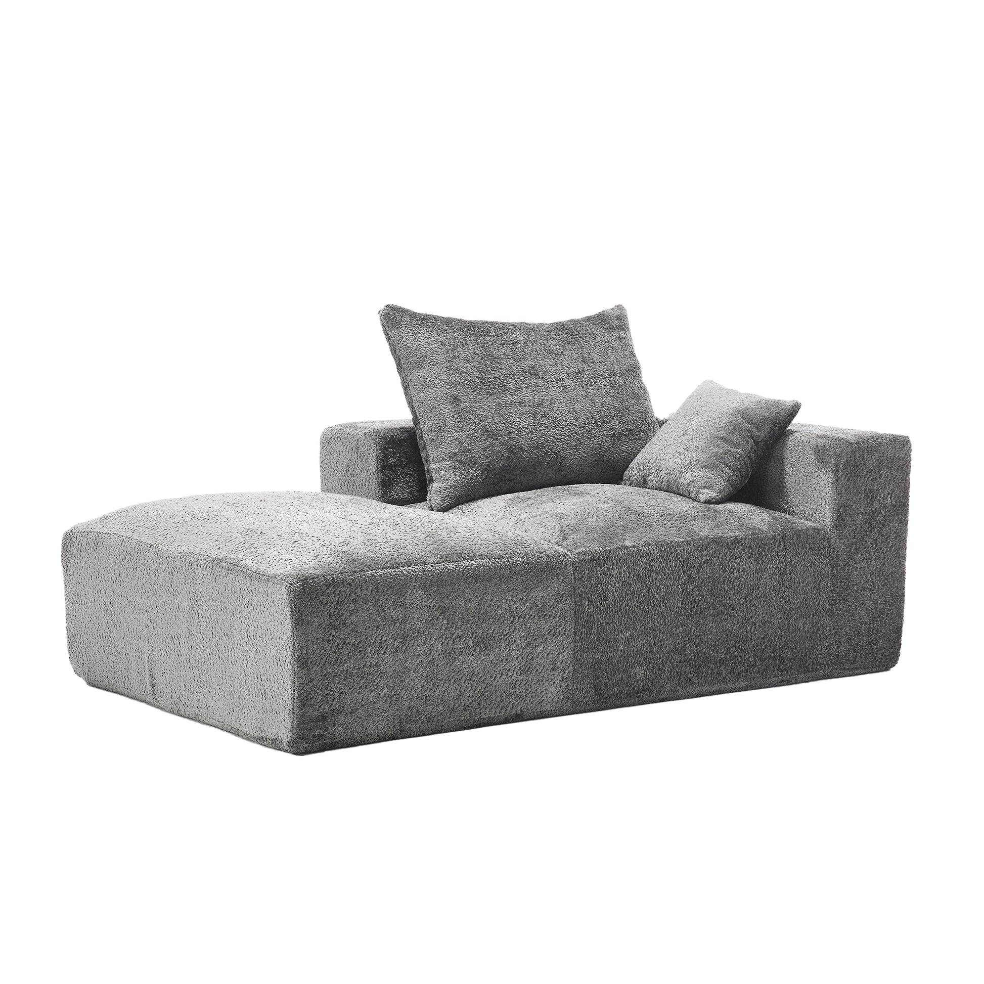 Plush grey chaise lounge with lumbar pillow