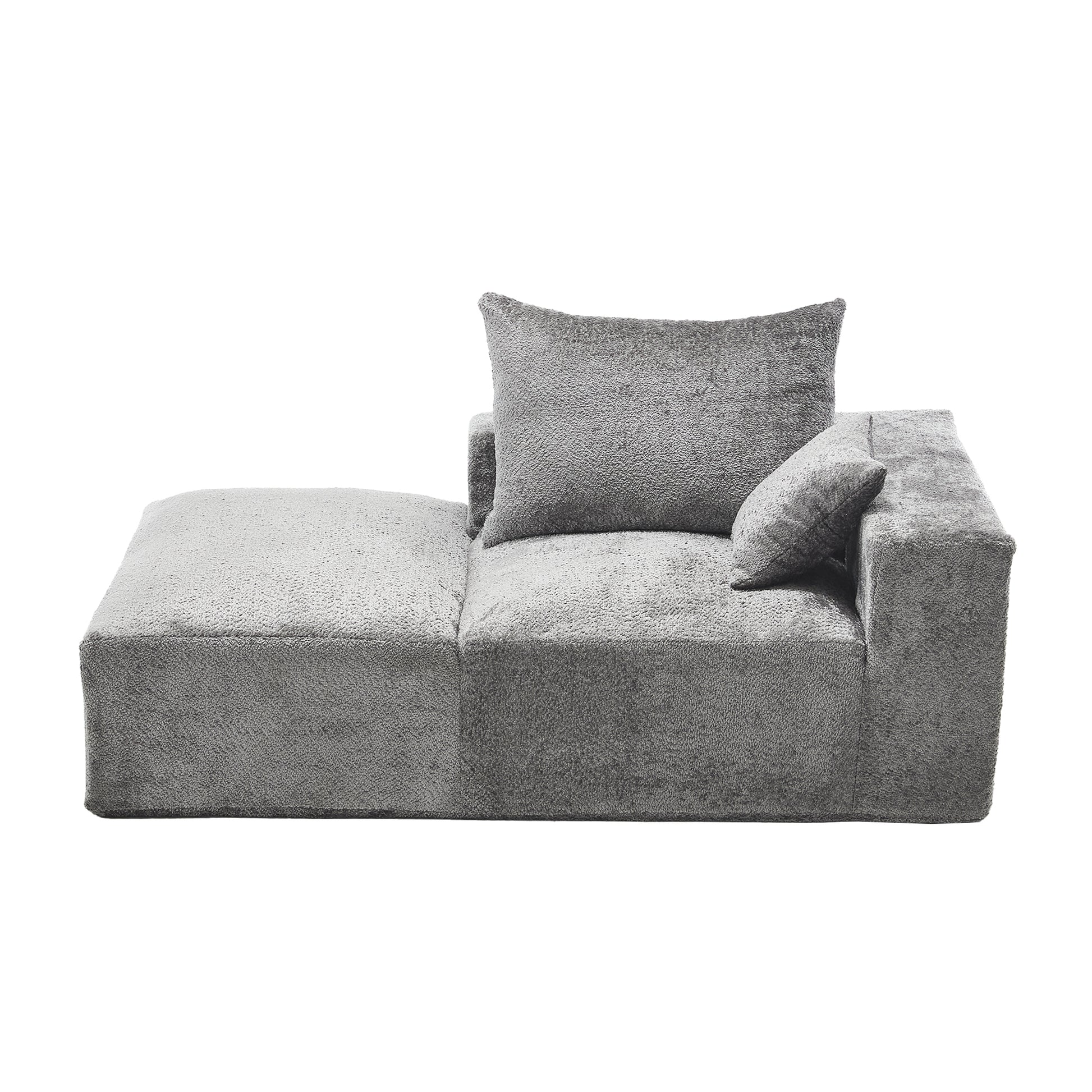 Grey sectional sofa with textured upholstery and lumbar pillow