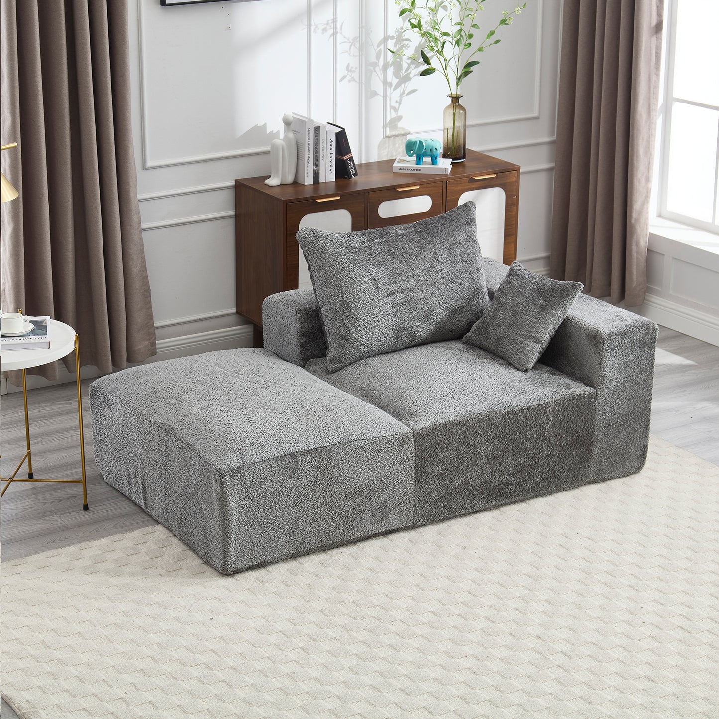 Plush grey sectional sofa with modular design and textured fabric