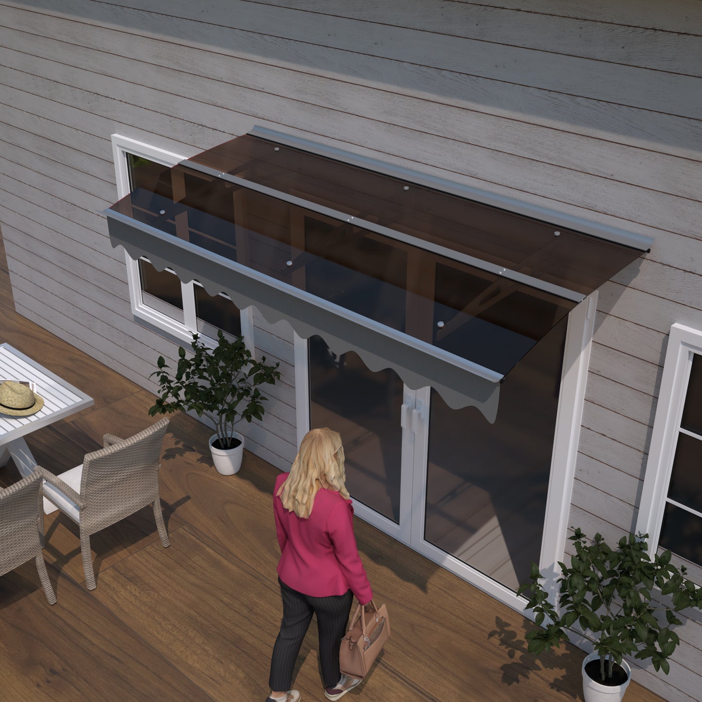 Modern brown polycarbonate door canopy with silver trim