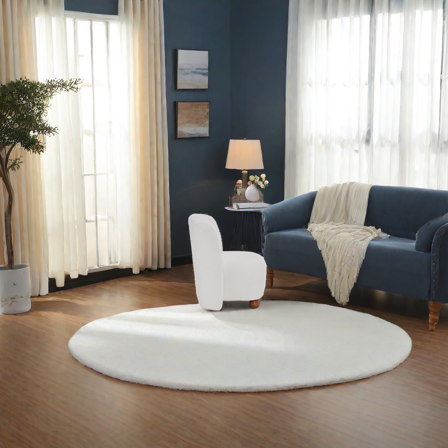 Plush white circular rug with textured shag