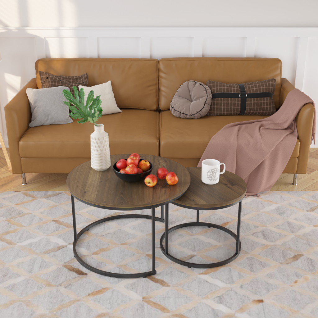Round walnut wood nesting coffee tables with black metal legs