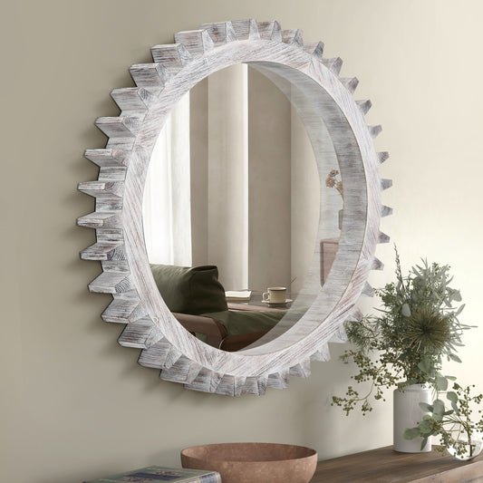 Round distressed white wood mirror with gearlike frame