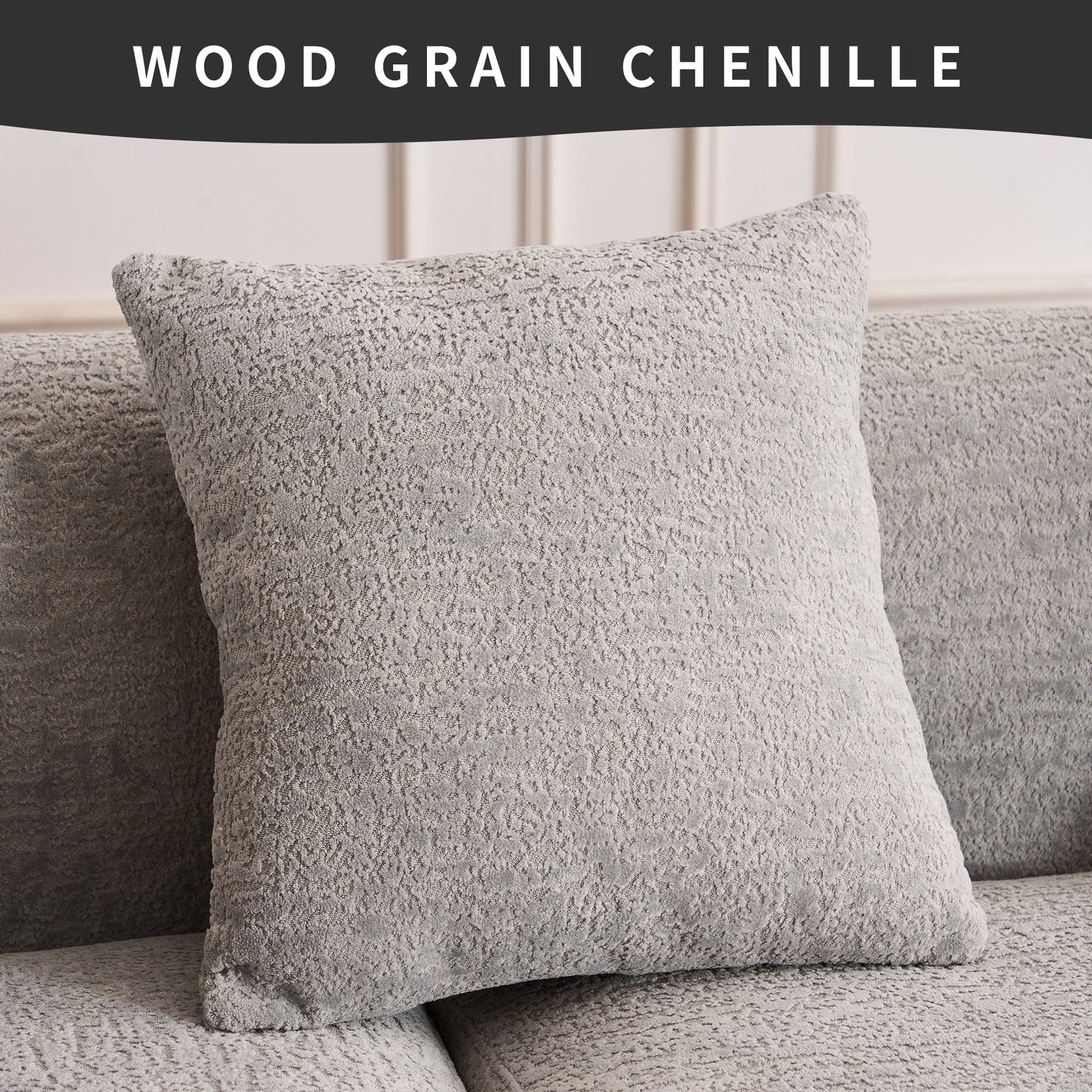 Closeup of a textured grey chenille throw pillow with a wood grain pattern
