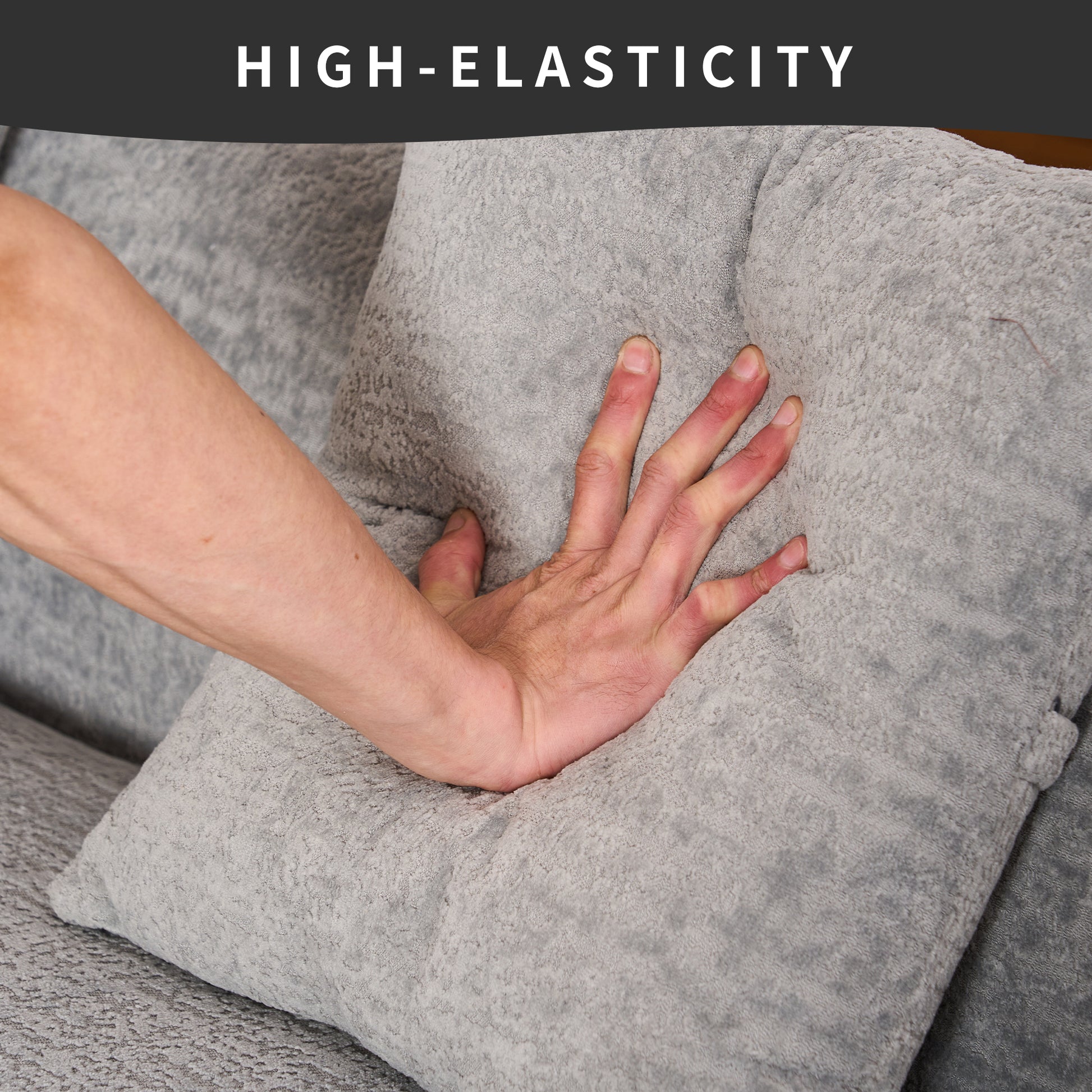 Gray chenille sofa cushion with hand pressing into its highelasticity fill