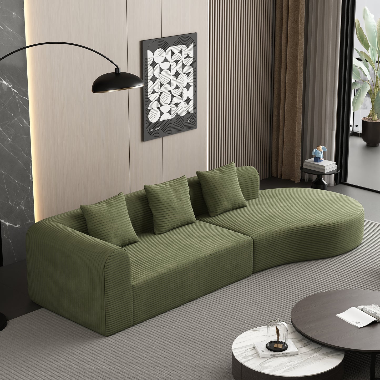 Green corduroy sectional sofa with plush cushions and curved design