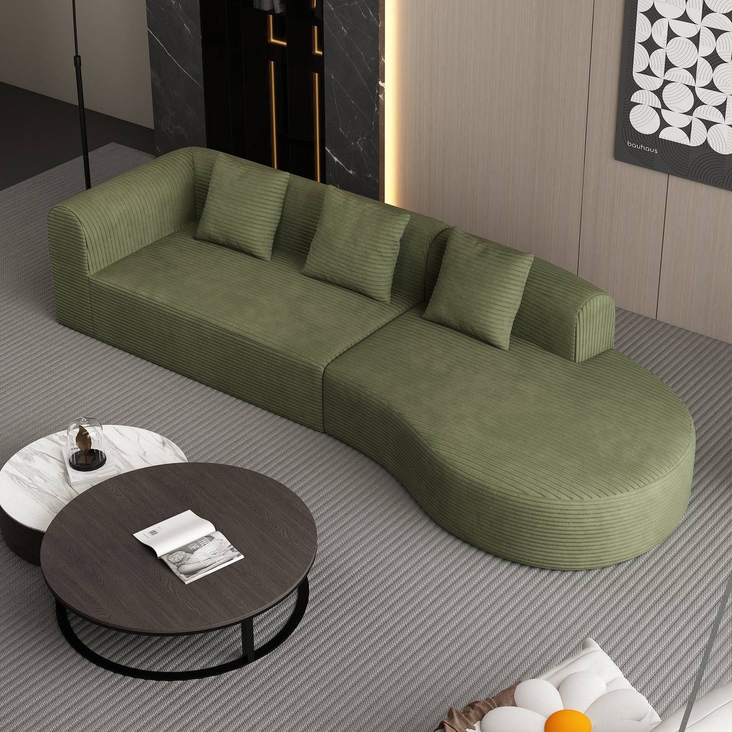 Curved green corduroy sectional sofa with four matching throw pillows