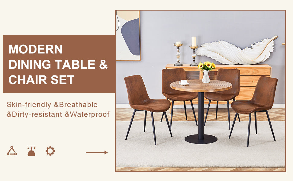 Brown suede dining chairs around a round wooden table