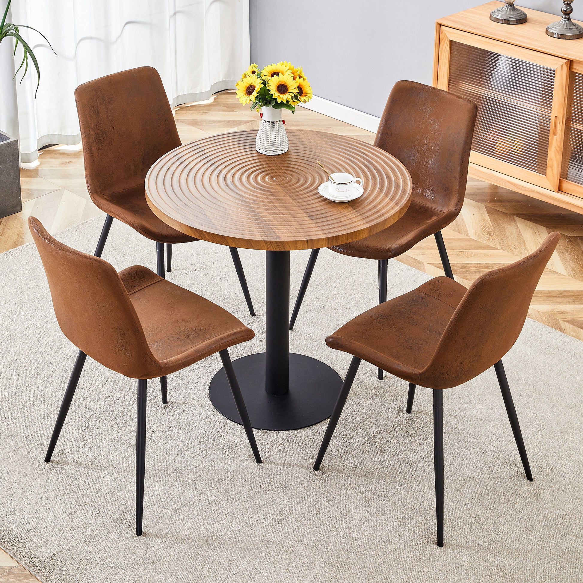 Brown faux leather dining chairs with black metal legs