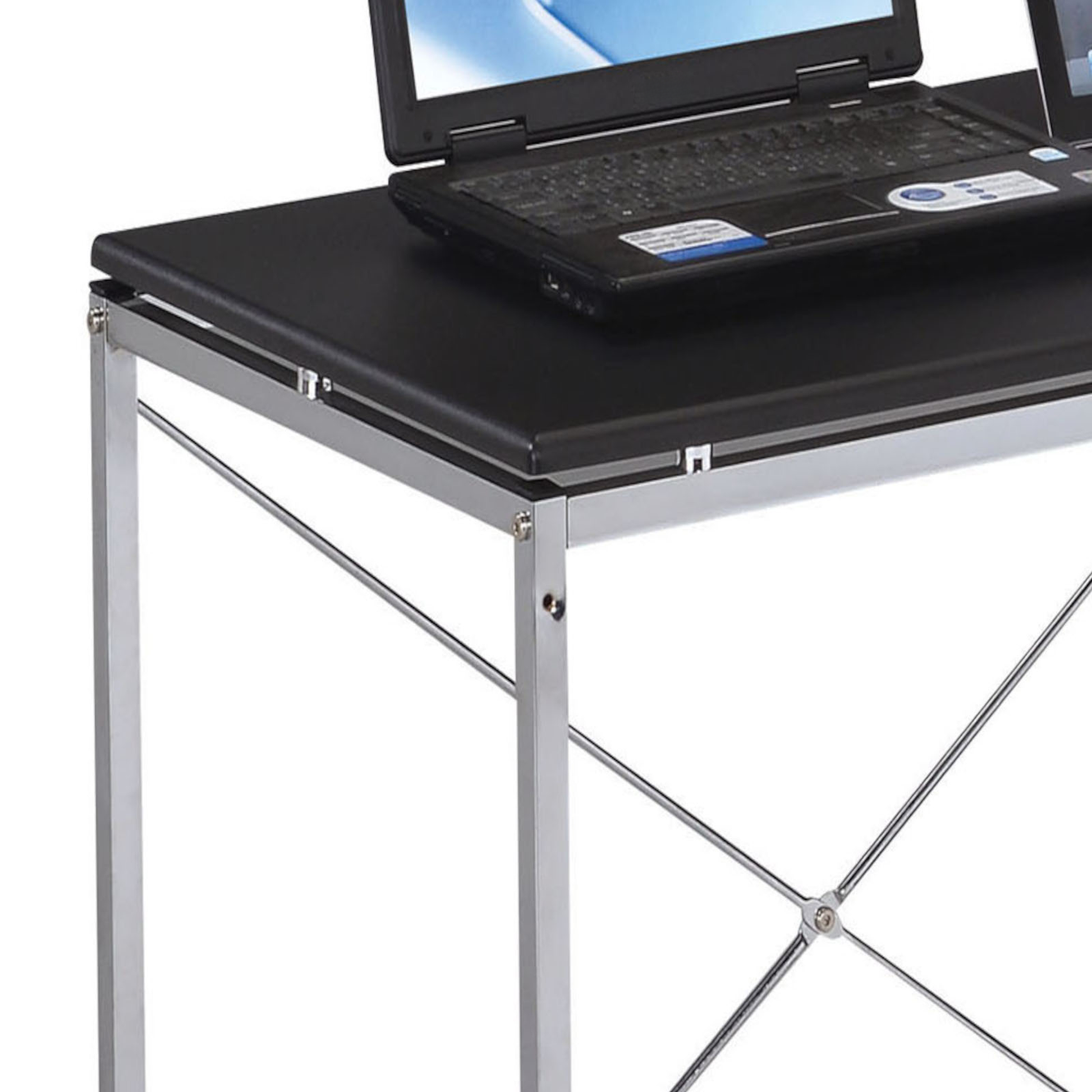 Black laptop on a modern chrome and black desk