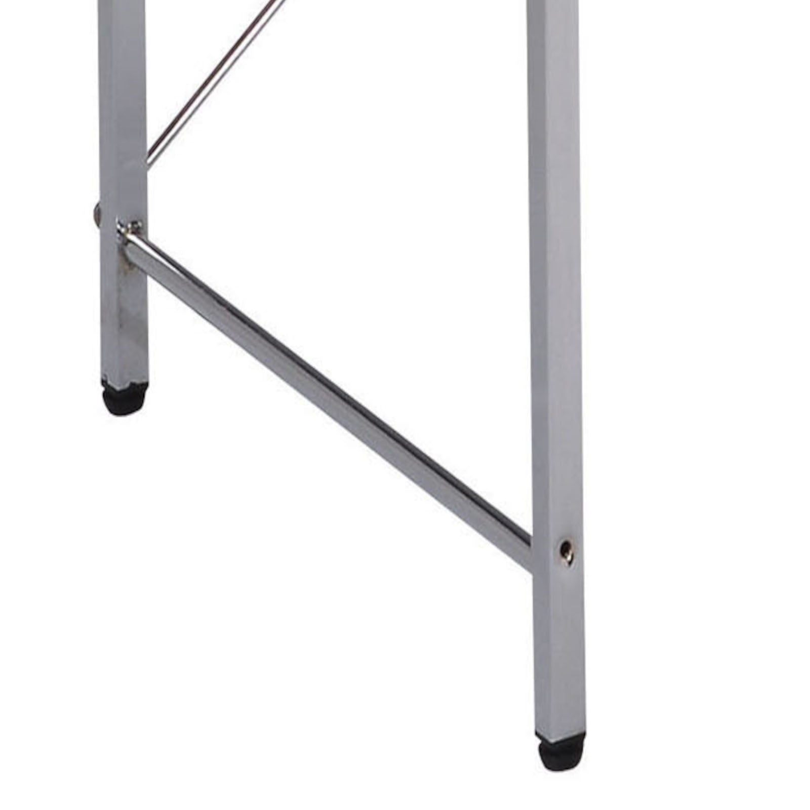 Closeup of silver folding table legs with black protective feet