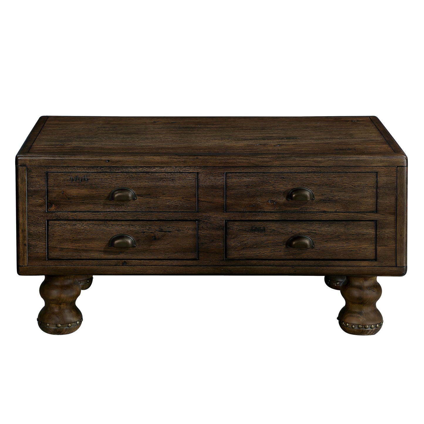 Rustic dark wood coffee table with four drawers and ornate carved legs