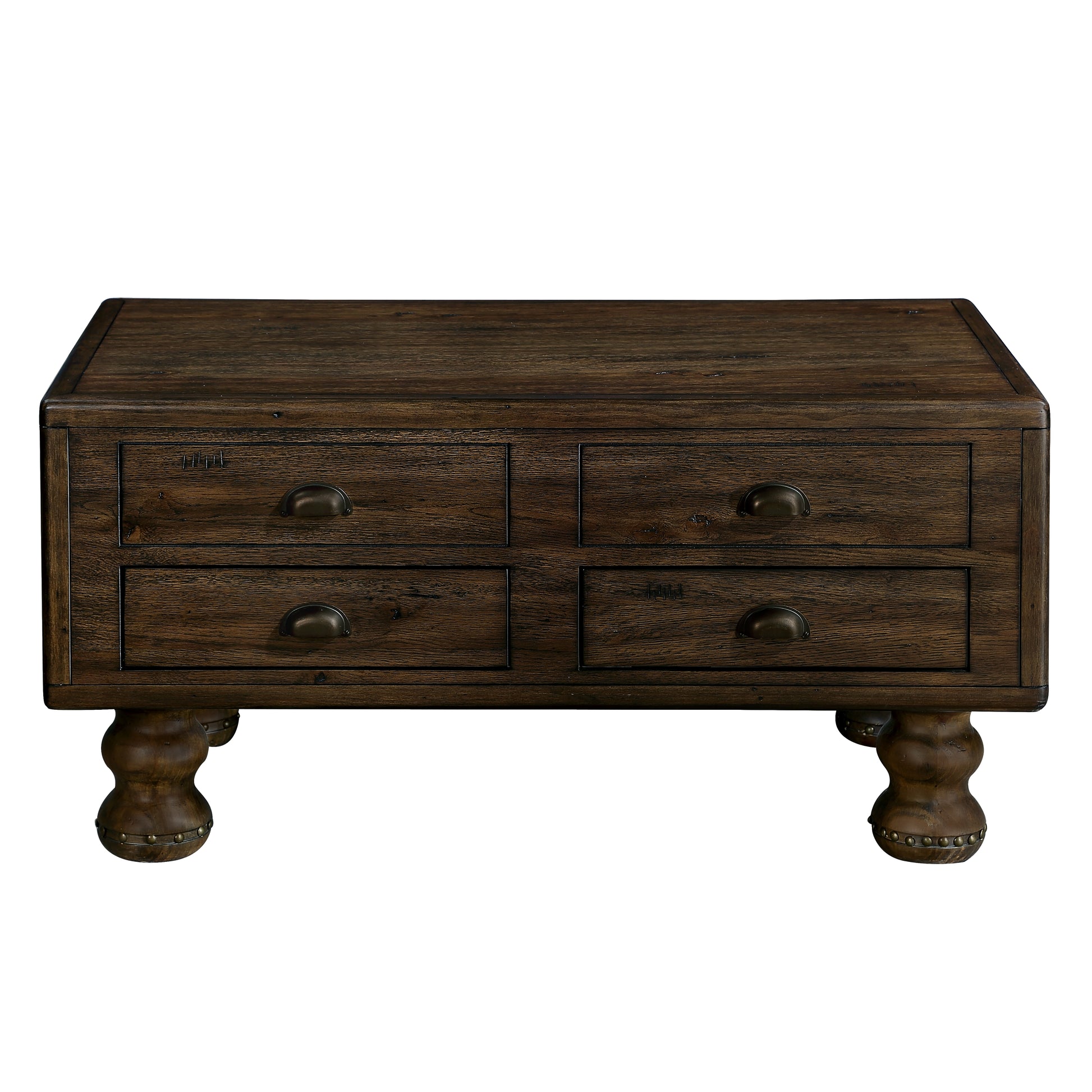 Rustic dark wood coffee table with four drawers and ornate carved legs